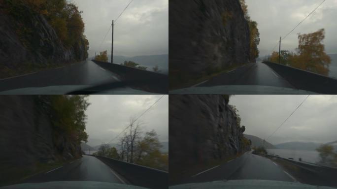 挪威峡湾驾驶的POV汽车: 在雨中