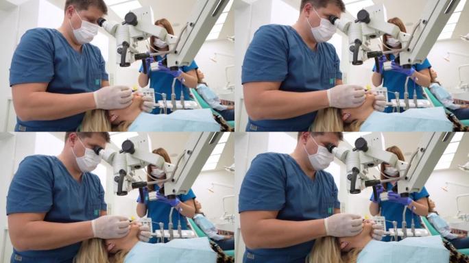 男性牙髓病患者用牙科显微镜修复女性患者的牙腔
