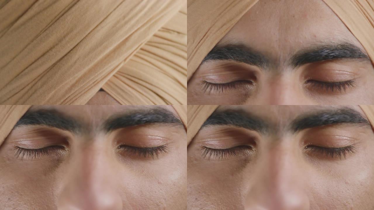 SLO MO TD印度男子戴着一只闭着眼睛的pagri