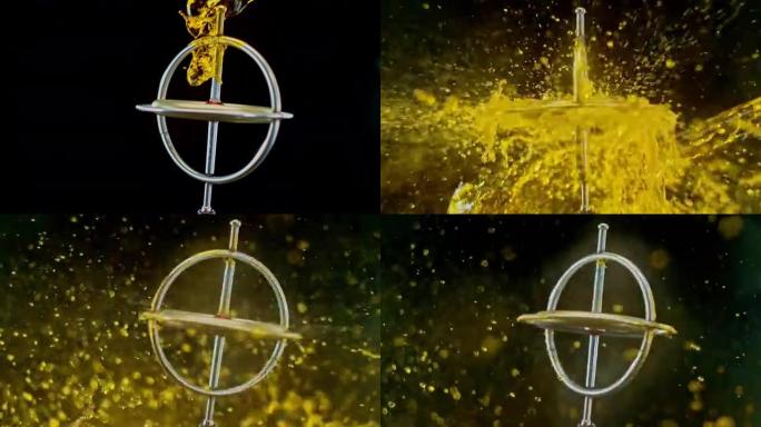 SLO MO LD黄色的水倒在旋转陀螺仪上
