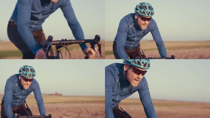 男性公路自行车手在空旷的地方超速行驶。耐力训练