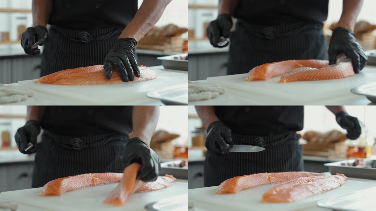 日本厨师将生鲑鱼切成寿司鲑鱼