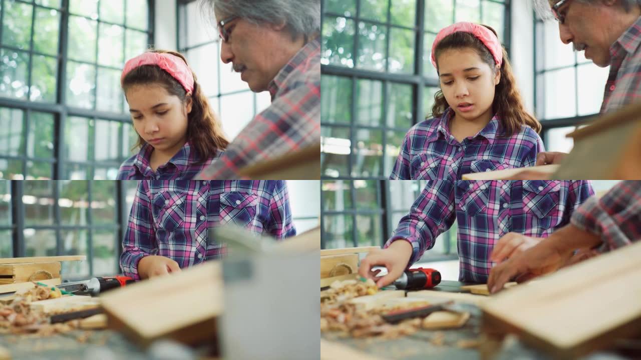 木工教学车间。爷爷和孙女在细木工。