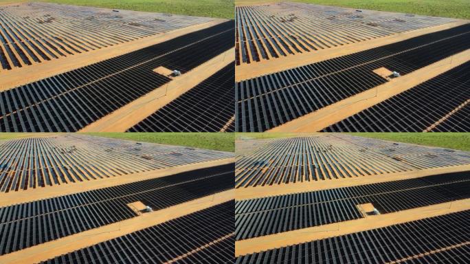 亚利桑那州纪念碑谷附近的大型太阳能农场的无人机空中飞行视图。绿色能源生产