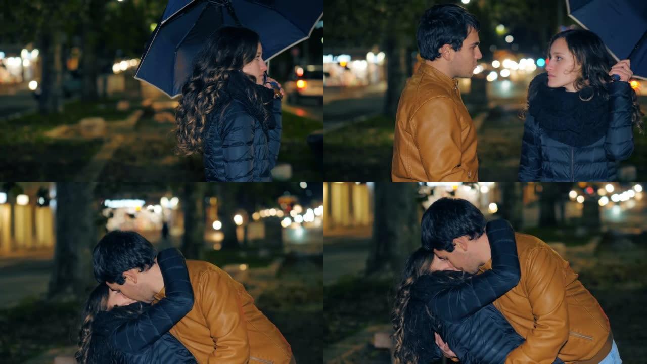 浪漫情侣-情侣在雨中相遇，像电影中一样亲吻