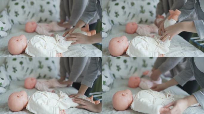 护士教新妈妈如何锻炼婴儿