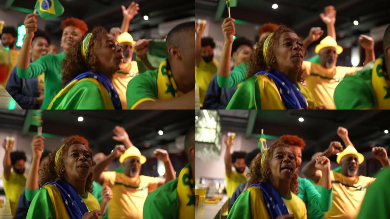 Brazilian team fan celebrating at bar