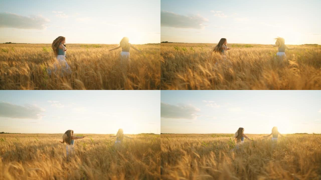 带着帽子的快乐小女孩一起在美丽的农田上奔跑，金色的黑麦