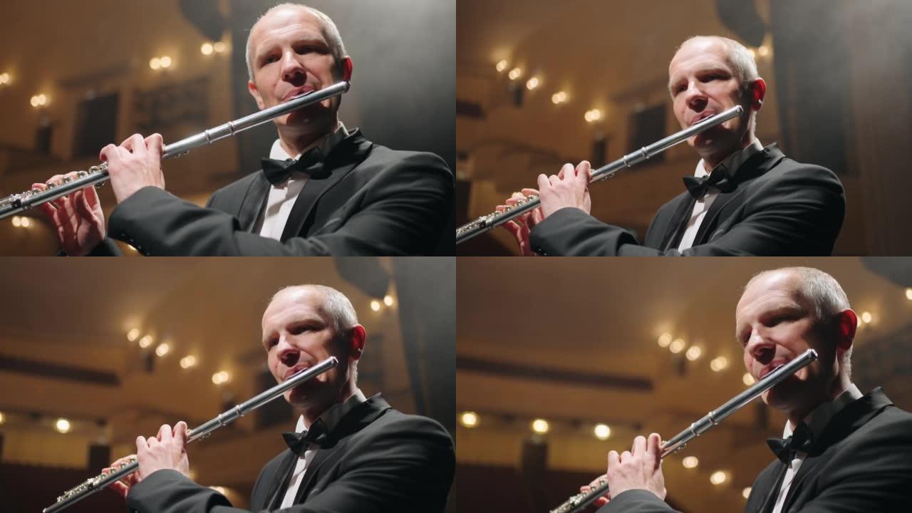 才华横溢的白发长笛演奏家正在歌剧院，交响乐团用长笛演奏音乐