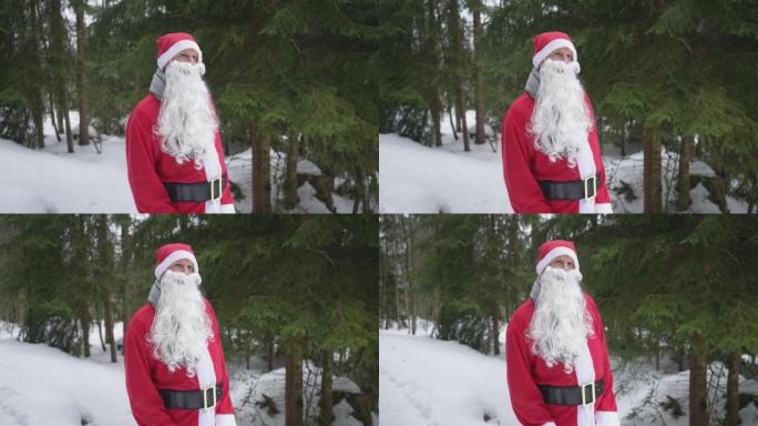 打扮成圣诞老人的男人望着森林
