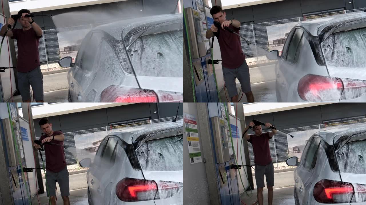 人用肥皂水清洗车辆