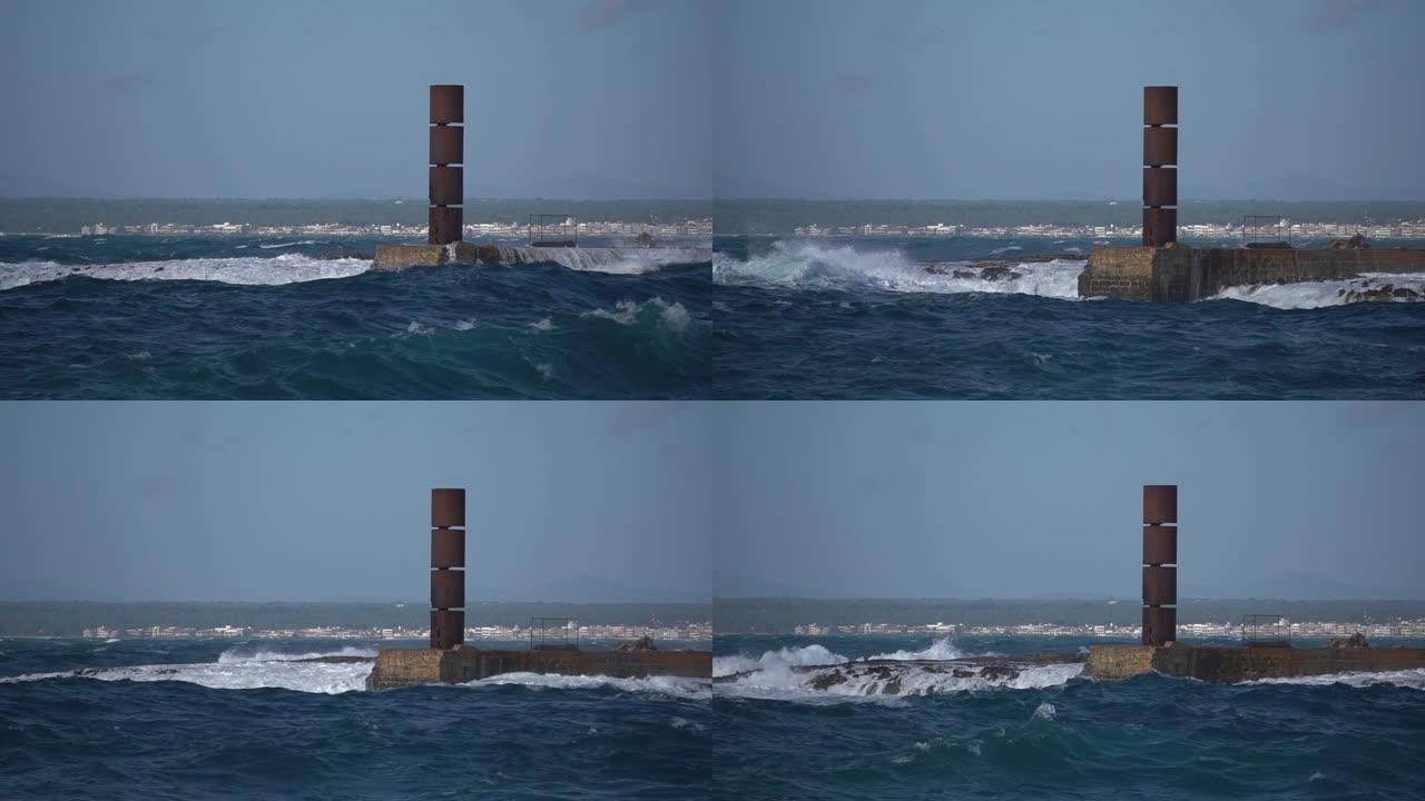 海浪冲过海岸线上生锈的铁结构，开始了海暴