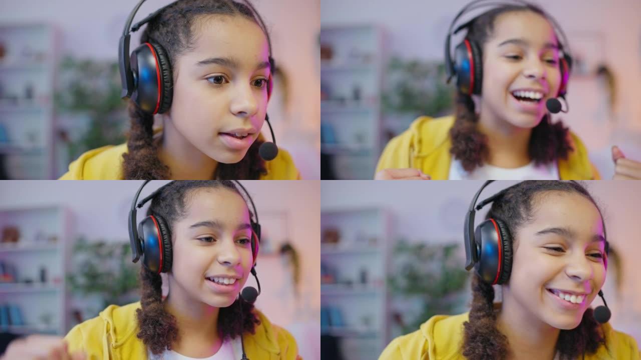 戴着耳机的黑人少女与视频游戏伙伴交谈，娱乐
