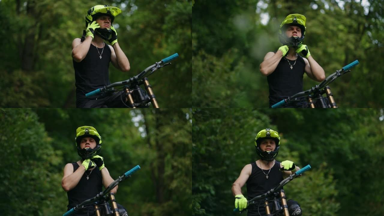MTB赛车手在森林步道，下坡或自由骑行，肖像的比赛或训练前戴头盔