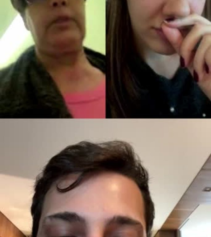 家庭在家庭视频会议-移动屏幕的观点
