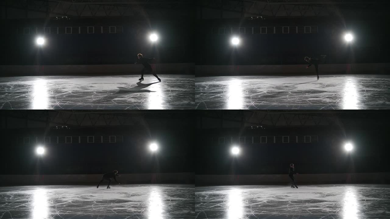 运动员在训练中进行蝶式跳跃。职业男花样滑冰运动员完美地表演了复杂的花样滑冰元素。男子在花样滑冰中表演