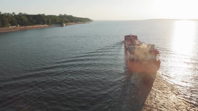 Cargo barge on the river in summer