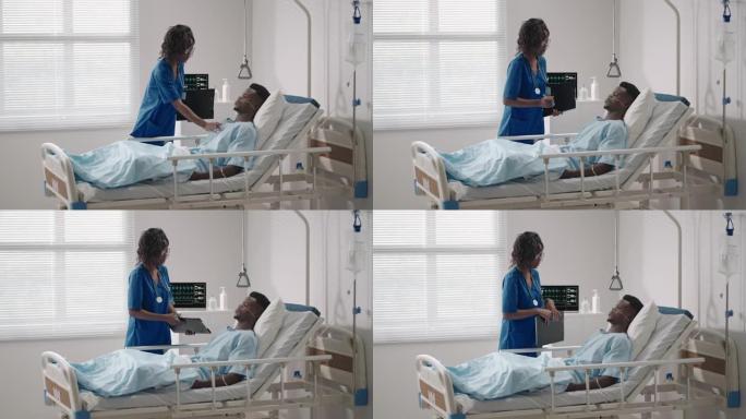 一名女医生检查并与躺在医院病床上的病人交谈