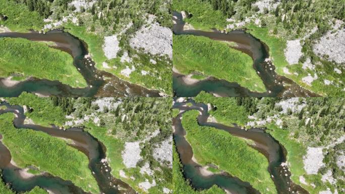 在充满活力的河流上的鸟瞰图穿过崎terrain的地形