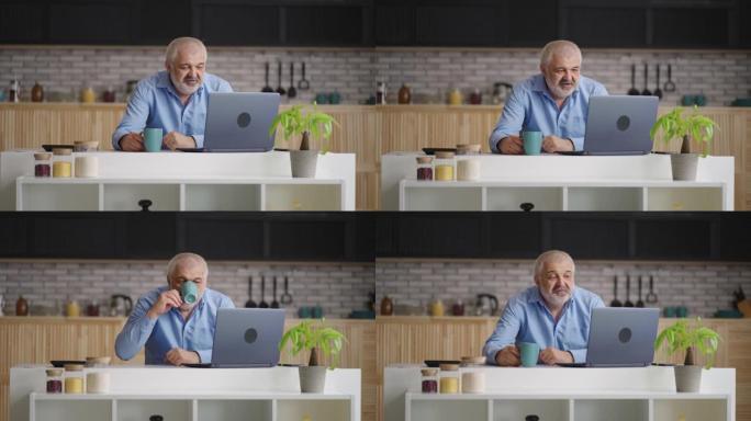 老人正在与朋友或家人通过笔记本电脑进行视频通话，在家庭厨房里的人的肖像