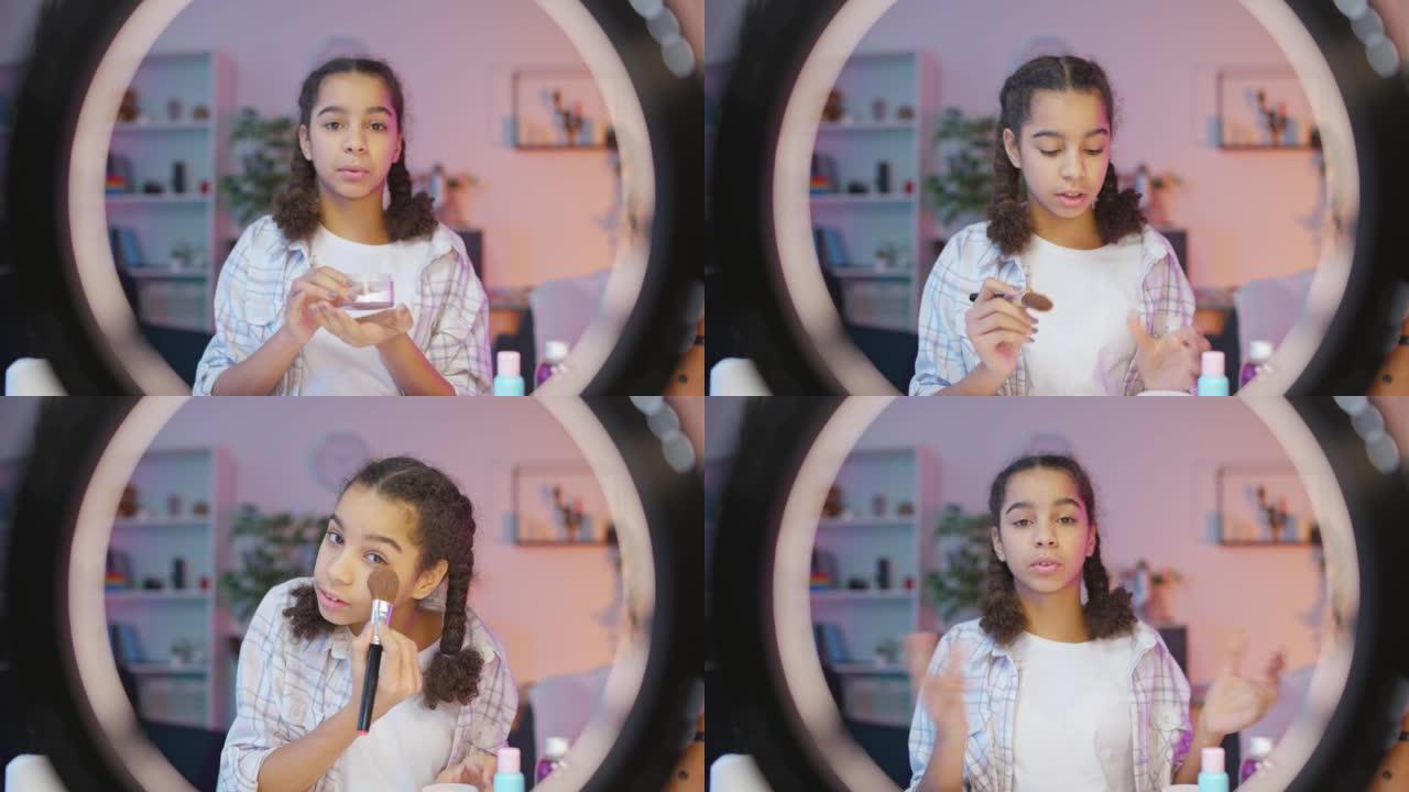 黑人少女为她的美容博客录制视频，化妆教程，视点