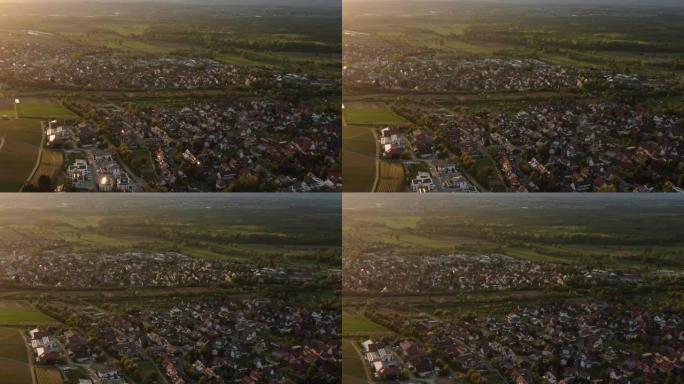日落时分的乡村小镇的空中无人机拍摄