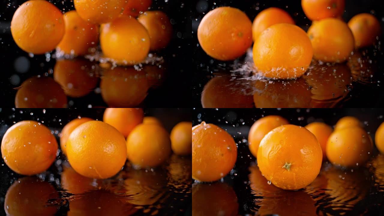 SLO MO橘子落在潮湿的表面上并在其上滚动