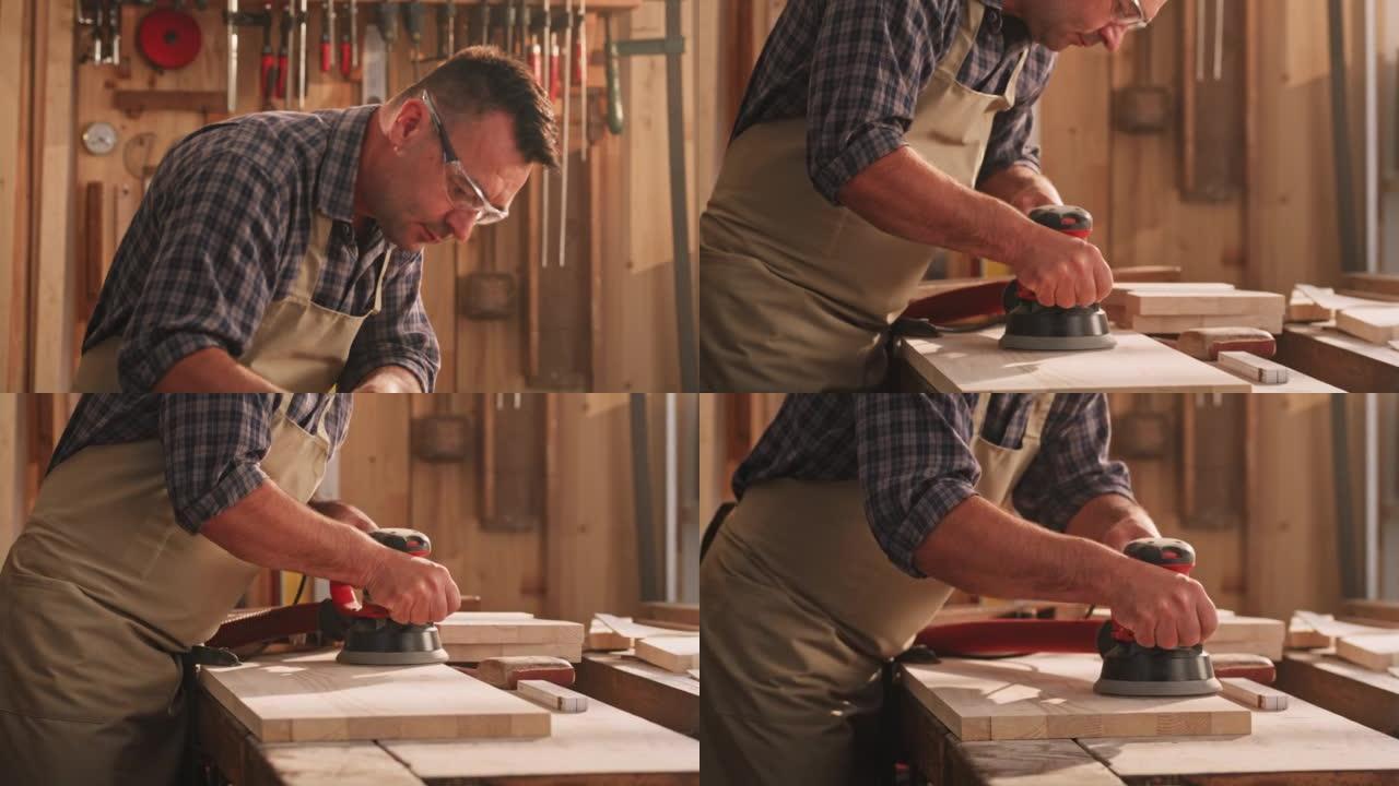 SLO MO TD男性木匠用轨道砂光机打磨木材