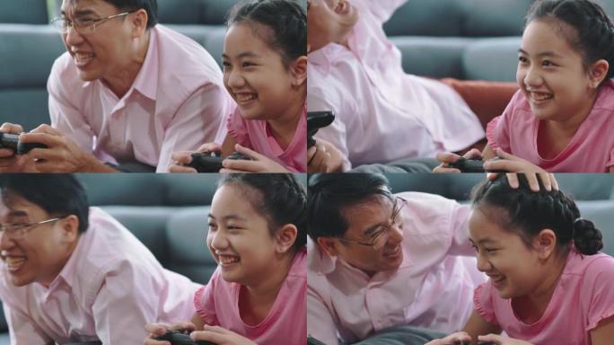 父亲和女儿玩电子游戏