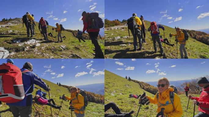 SLO MO POV一群徒步旅行者在阳光明媚的山顶上