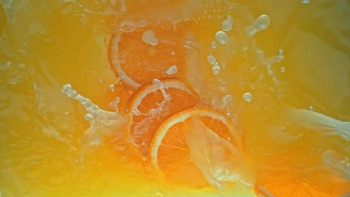 SLO MO LD橙片落入果汁中