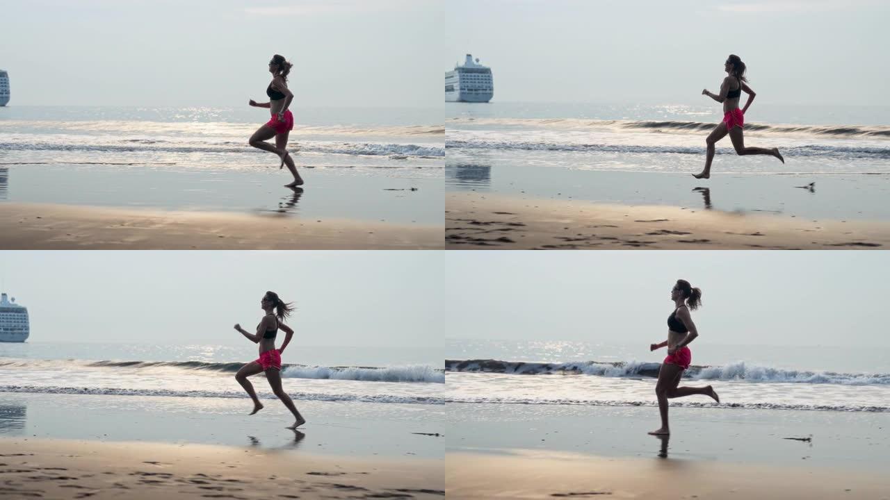 海滨慢跑训练。享受阳光和自由。背景中的渡轮