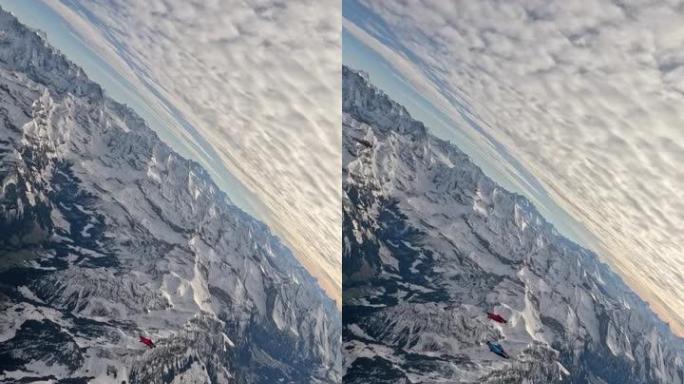 翼服飞行者在瑞士山区景观上空翱翔