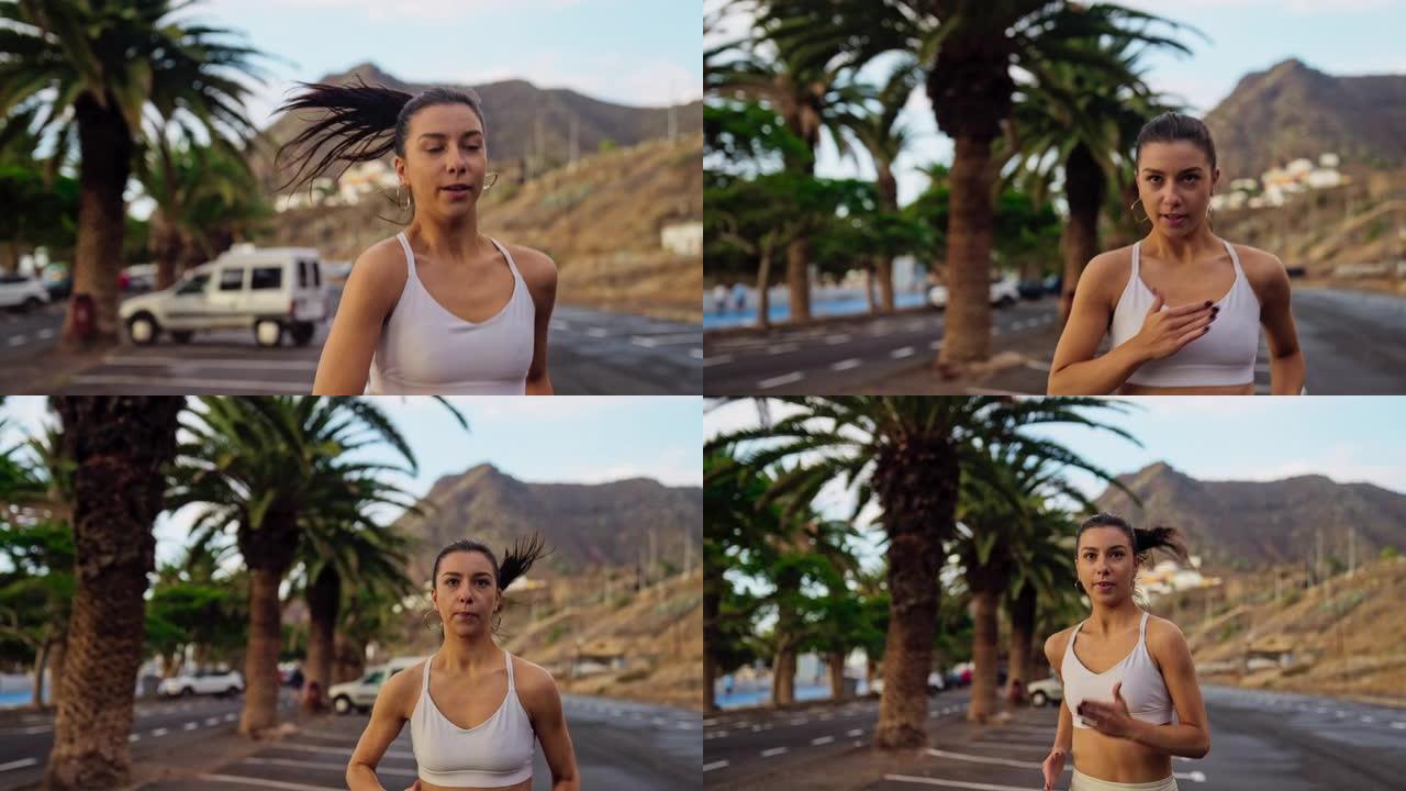 美丽的女人在地中海小镇慢跑。热带气候