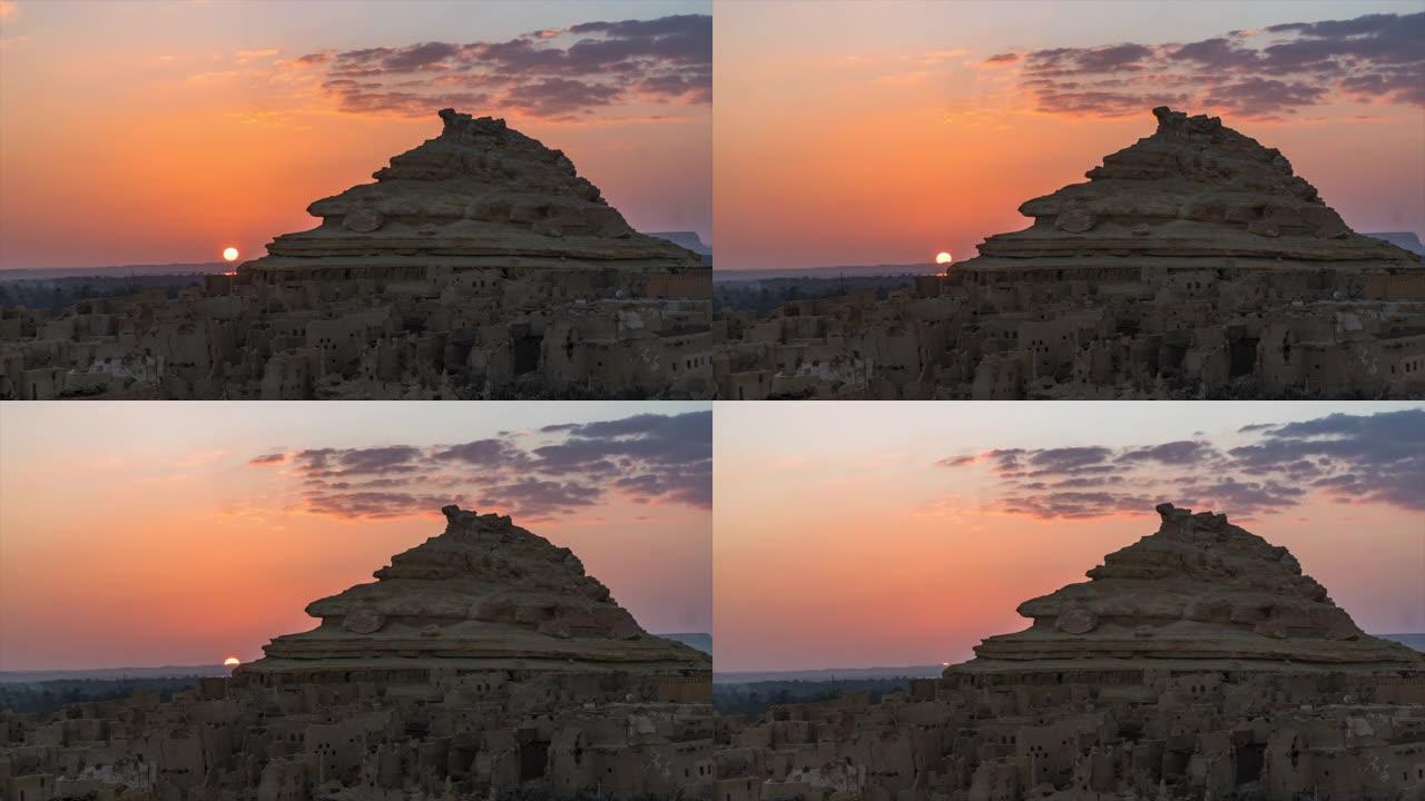 日落时的古埃及村庄，乌云密布