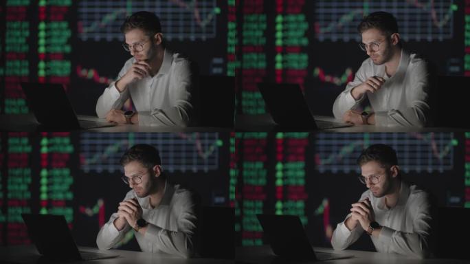 戴眼镜的专业人士看着电脑显示器屏幕，思考分析证券市场。沉思困惑的经纪人等待股票的增长