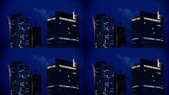 空中拍摄一座拥有现代摩天大楼的城市在夜间建造