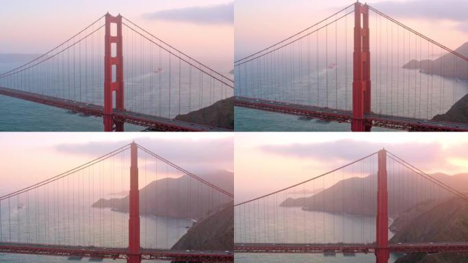 日落时沿着旧金山金门大桥塔楼的天线