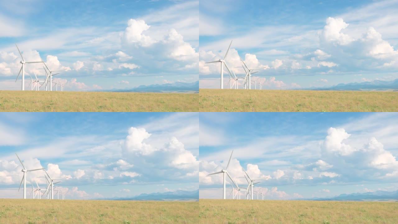 风力涡轮机和草原景观，远山