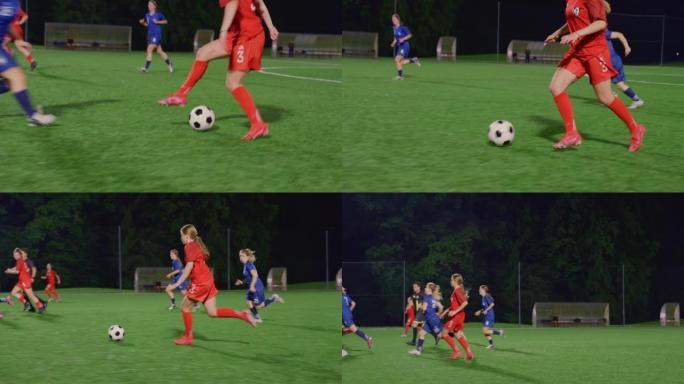 SLO MO TS女足球运动员运球并将球踢向球门