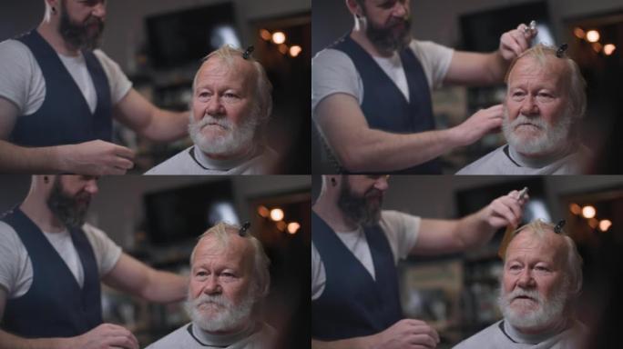 理发店，一名花白胡子的时髦老人在理发店理发