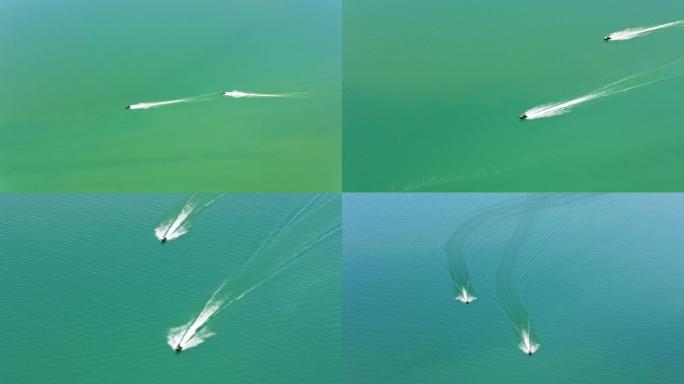 空中两辆水上踏板车在加利福尼亚州沙斯塔湖上飞驰