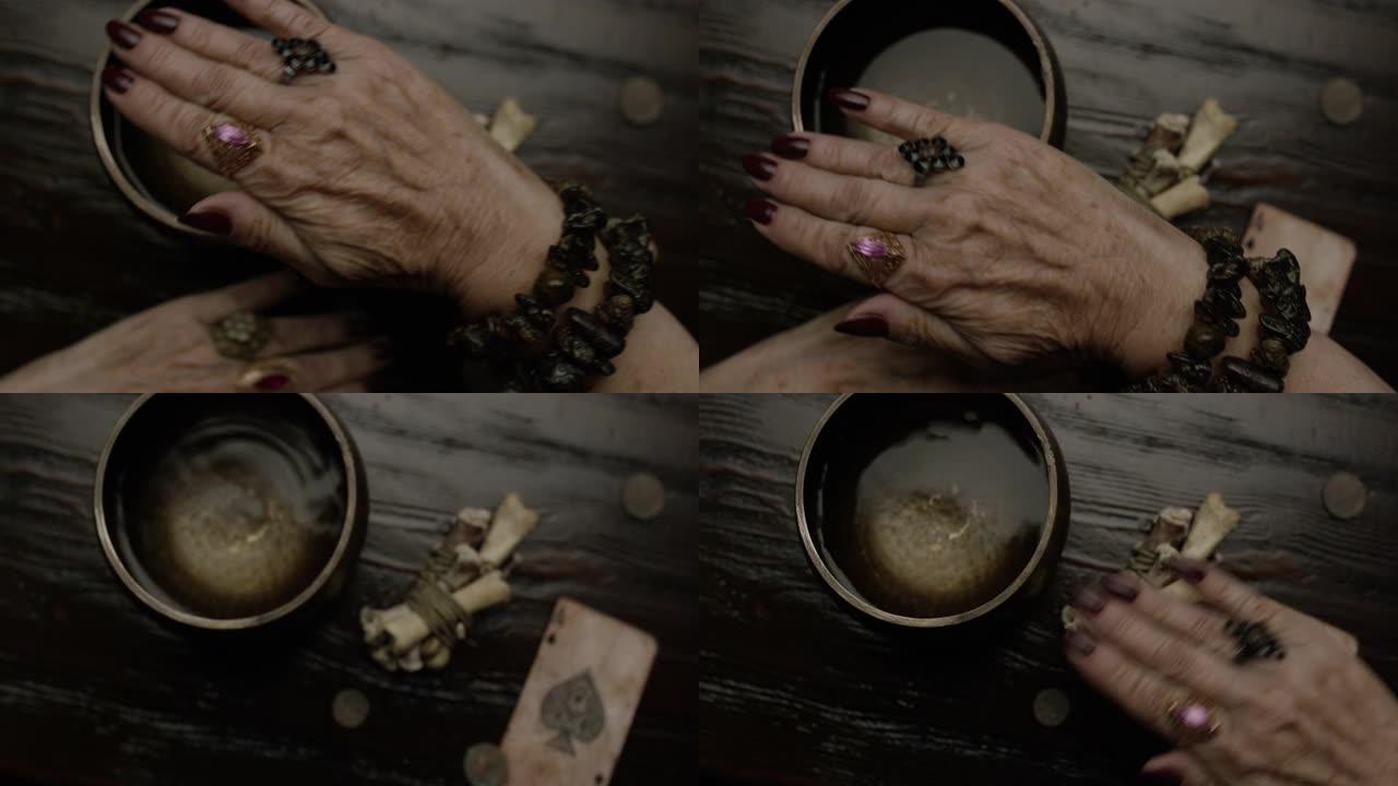 女巫和巫师的魔法属性，骨头，圣杯，手。