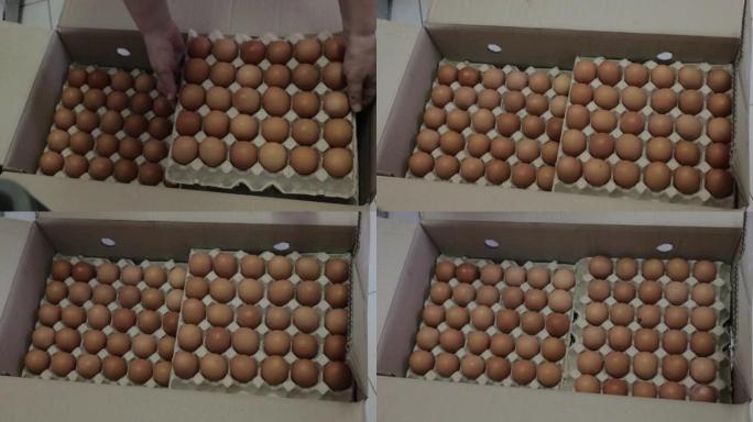 盒子里有鸡蛋的纸箱，在面包店