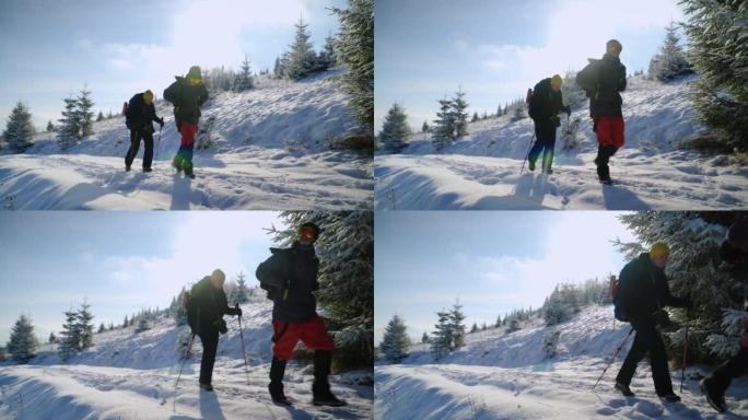 男性徒步旅行者跋涉进入冬季山区景观
