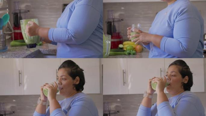 巴西妇女在厨房喝排毒冰沙以减少身体超重。做锻炼后提神。