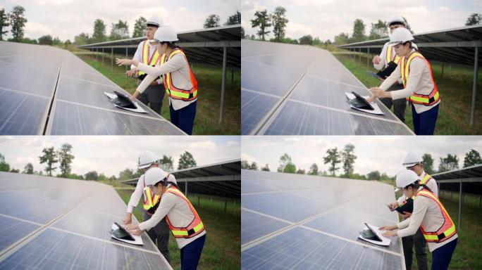 太阳能电池板发电站，电气工程师检查建筑物外的太阳能电池农场。