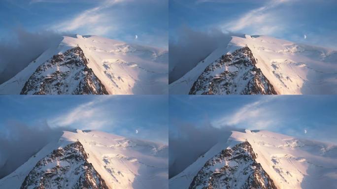 从上面看雄伟的阿尔卑斯山。冰山和雪覆盖的尖峰