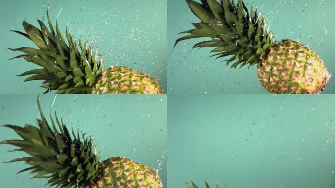 绿松石蓝色背景下的菠萝慢动作飞行