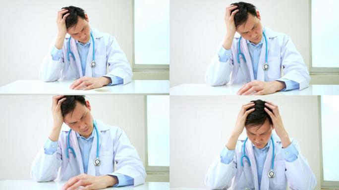 因过度劳累而紧张的年轻医生在医院里手拉手，过度劳累的医生后悔错误的诊断观念